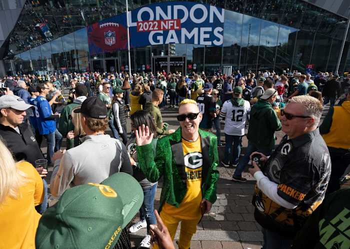 Racine residents Allen Mierisch, left, and David Gautsch socialize before the Green Bay Packers game against the New York Giants on Sunday outside Tottenham Hotspur Stadium in London. (Photo by Mark Hoffman/USA Today Sports)